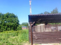 стальной навес с двускатной крышей из металлочерепицы